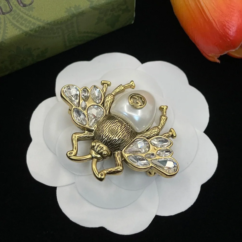 Gucci. gold tone